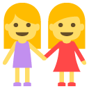 two women holding hands